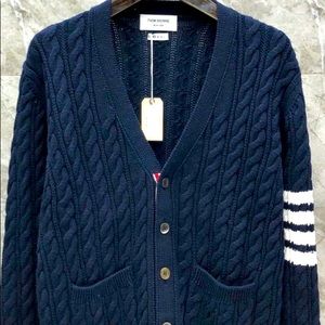 New, never worn cardigan, size Medium. Received as a gift but not my style!